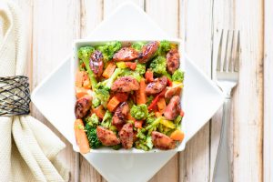Sausage & Steamed Veggies with Pineapple Sriracha Sauce. This whole foods recipe gluten free and paleo, making it a delicious alternative to processed foods. You won't beleive how good this tastes.