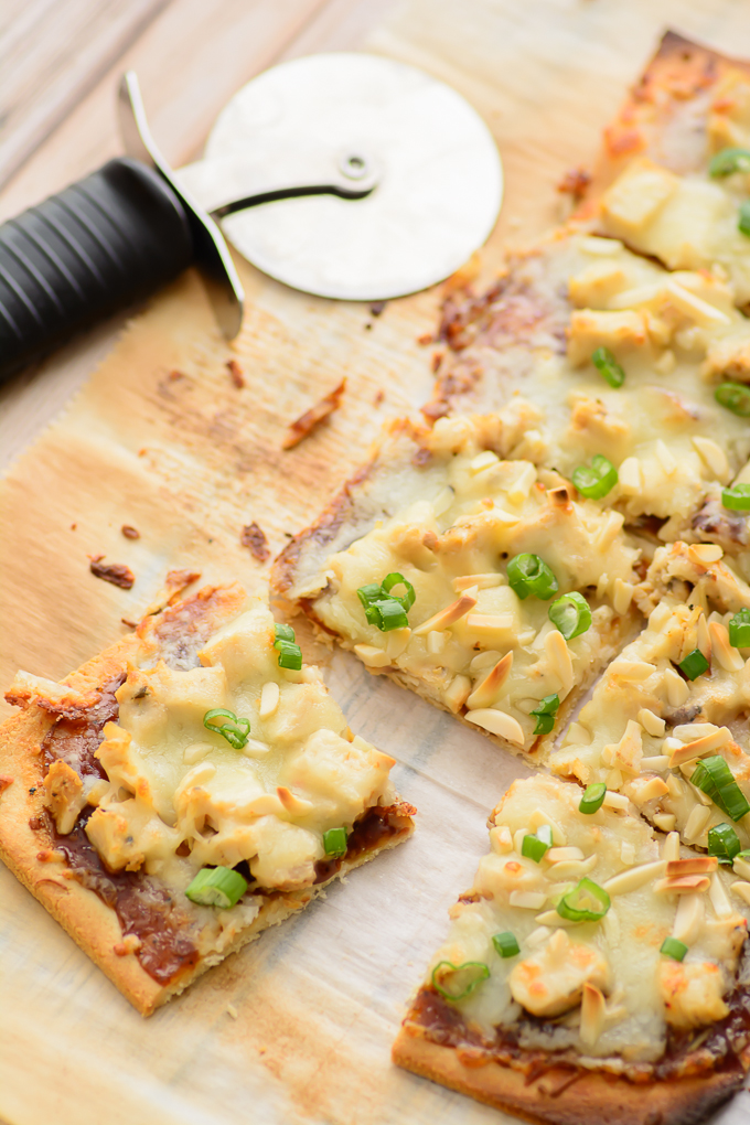 Gluten Free Spicy Chicken Flatbread. Great gluten free recipe for lunch or dinner. Made with an almond flour crust and simple ingredients. Could be made into a paleo recipe if you don't use the cheese. Yum!