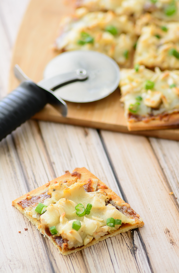 Gluten Free Spicy Chicken Flatbread. Great gluten free recipe for lunch or dinner. Made with an almond flour crust and simple ingredients. Could be made into a paleo recipe if you don't use the cheese. Yum!
