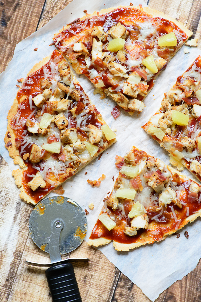 Delicious, good for you gluten free BBQ chicken flatbread. Indulge your tastebuds with bacon, bbq sauce, chicken and pineapple! So easy to make and tastes like summer!