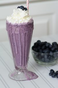 This blueberry milkshake recipe is a healthier way to indulge your sweet tooth. Minimal ingredients and minimal guilt make this the number one blueberry milkshake recipe out there.