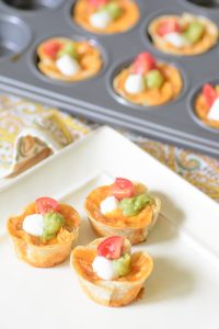 Cheesy Chicken Enchilada Bites. The melty cheesy center and zesty enchilada sauce combine to create a delectable flavor explosion. This is a must try appetizer recipe for your next party.