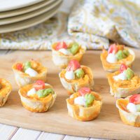 Cheesy Chicken Enchilada Bites. The melty cheesy center and zesty enchilada sauce combine to create a delectable flavor explosion. This is a must try appetizer recipe for your next party.