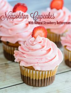 Neopalitan Cupcakes. Made with all natural ingredients and topped with a delicious real strawberry buttercream. Fun cupcake recipe!