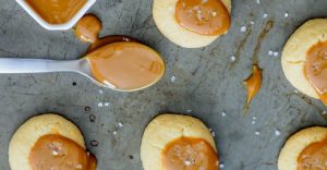 Gluten Free Caramel Thumbprint Cookies: Only 6 ingredients to these melt-in-your-mouth holiday cookies. Buttery and soft with the perfect amount of caramel. They are simply delicious!