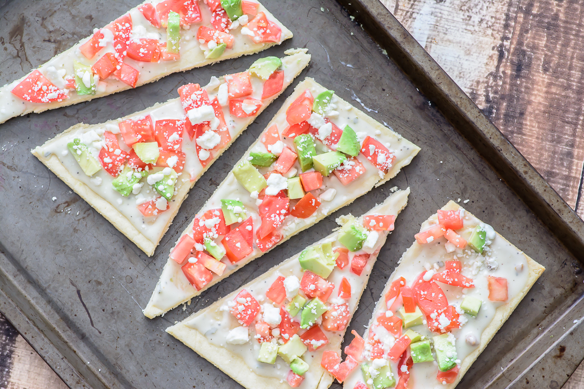 This skinny gluten free flatbread is packed with healthy fats and protein that will fill you up without filling you out! One of the easiest gluten free recipes out there. 