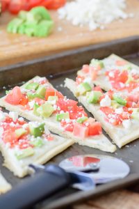 This skinny gluten free flatbread is packed with healthy fats and protein that will fill you up without filling you out! One of the easiest gluten free recipes out there.