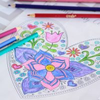 FREE Valentine's Day Coloring Pages for Grown Ups. What a great Valentine's Day activity to do with your kids or even your sweetie.....the couple that colors together, stays together, or so I've heard :)