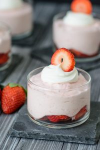 3 Ingredient Strawberry Mousse - This sweet, light and addicting dessert is sure to satisfy your sweet tooth! Can even be made into a paleo mousse recipe with a few simple tweaks. Have to try this!