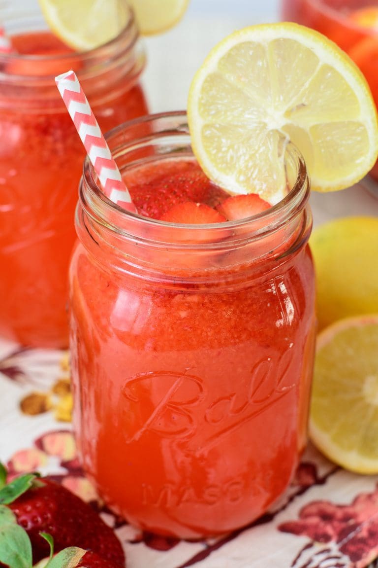 This Strawberry Lemonade recipe is wonderfully refreshing & sweet. Made from scratch with fresh lemon juice and strawberries, everyone is sure to love this recipe!