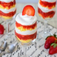 Grain Free Strawberry Shortcake Trifles. This light and delicious trifle layered with strawberry sauce, grain free shortcake and whipped cream is sure to be a hit with the whole family!