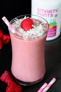 This Raspberry Coconut Breakfast Smoothie is sweet, creamy, healthy, and SO delicious! Start your morning off on the right foot with this amazing smoothie recipe!