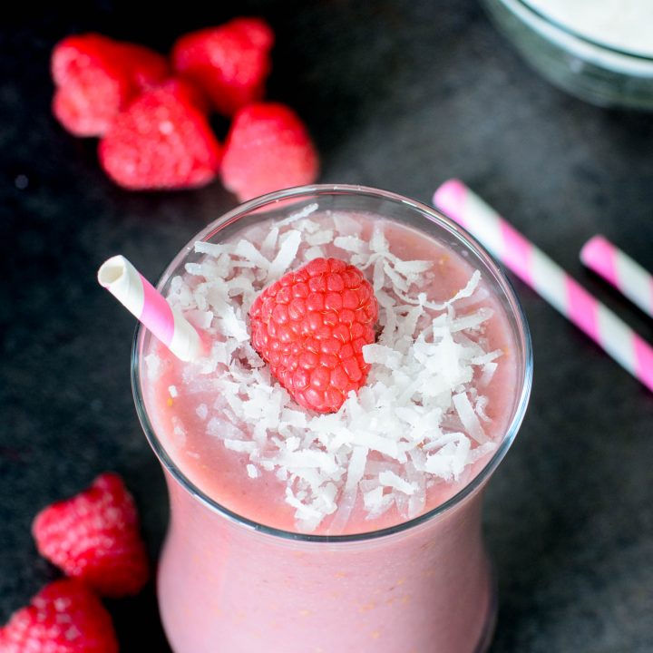 This Raspberry Coconut Breakfast Smoothie is sweet, creamy, healthy, and SO delicious! Start your morning off on the right foot with this amazing smoothie recipe!
