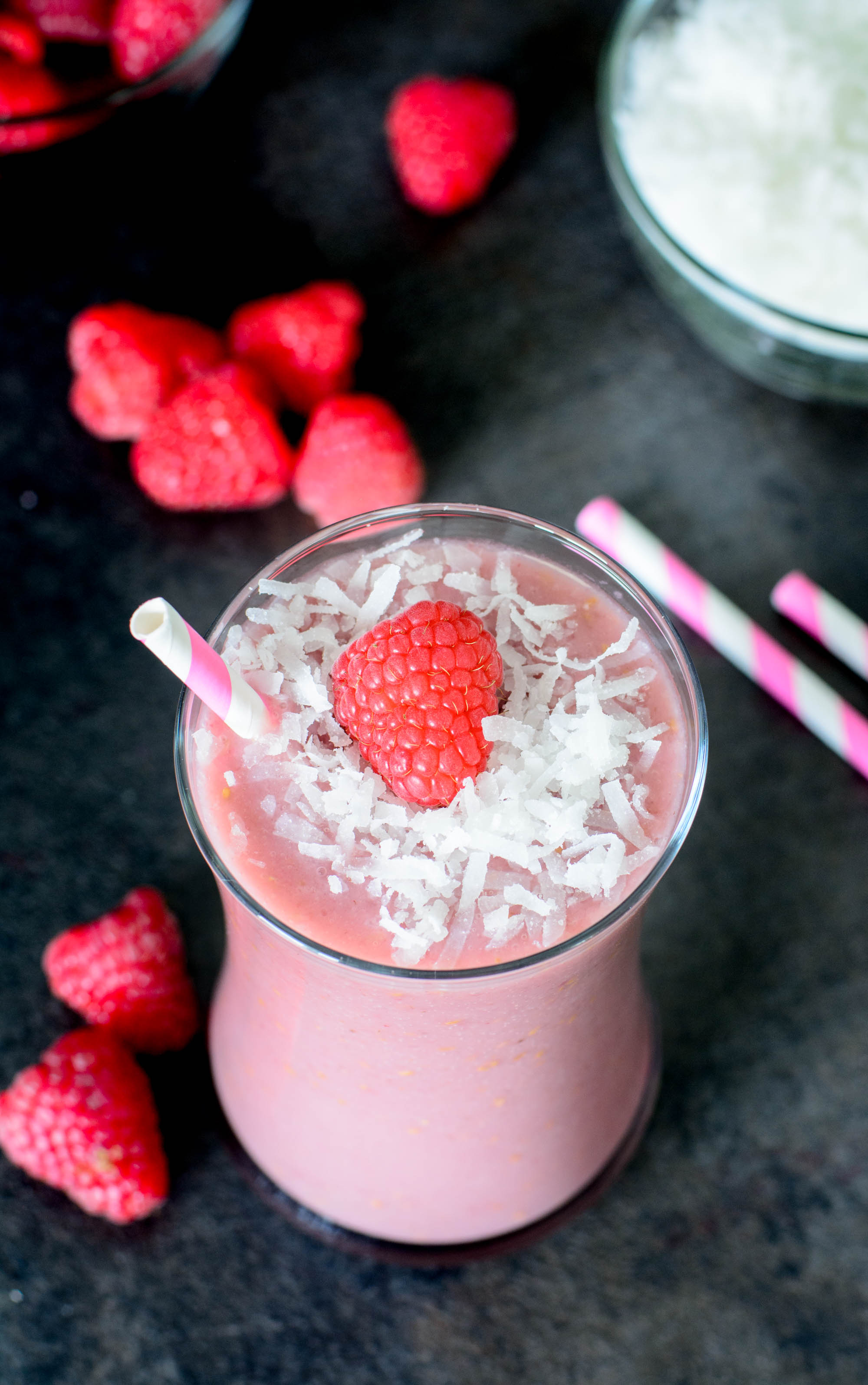 This Raspberry Coconut Breakfast Smoothie is sweet, creamy, healthy, and SO delicious! Start your morning off on the right foot with this amazing smoothie recipe! 