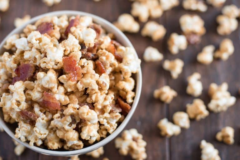 Maple Bacon Popcorn. Sweet maple syrup and savory bacon combine in this heavenly popcorn recipe that is sure to make your taste buds shout for joy!